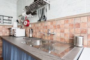 Kuchyňa alebo kuchynka v ubytovaní Penthouse Terrace