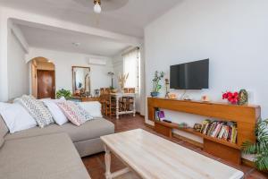 Televízia a/alebo spoločenská miestnosť v ubytovaní Penthouse Terrace