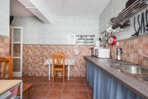 Kuchyňa alebo kuchynka v ubytovaní Penthouse Terrace