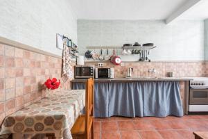 Kuchyňa alebo kuchynka v ubytovaní Penthouse Terrace