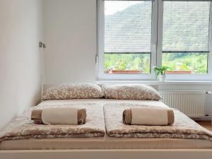 Postel nebo postele na pokoji v ubytování Apartment Loyd, Tolmin - Most na Soči