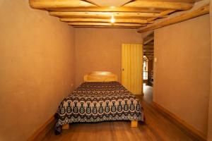 Postel nebo postele na pokoji v ubytování Casa cabaña privada en el Valle Sagrado Urubamba