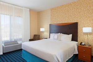 a hotel room with a large bed and a window at Fairfield Inn and Suites by Marriott El Paso in El Paso