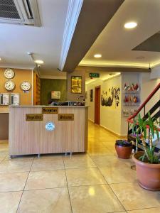 a lobby with a reception desk in a building at Ulubat Castle Hotel in Istanbul