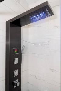 a elevator in a building with a sign on the wall at Entire house - 4 Bedroom & 2 Bath, 5 Min to Beach in Oceanside