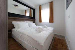 Posteľ alebo postele v izbe v ubytovaní Villa Bauhaus Gold