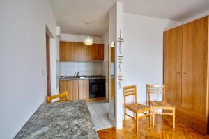 Kuchyň nebo kuchyňský kout v ubytování Anmarie Apartments Crikvenica