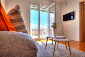 TV a/nebo společenská místnost v ubytování Anmarie Apartments Crikvenica