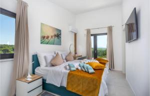 Postel nebo postele na pokoji v ubytování Pet Friendly Apartment In Malinska
