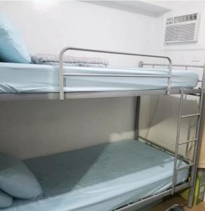 Postel nebo postele na pokoji v ubytování 2Bedrooms Staycation in Tagaytay + 13 fotografií