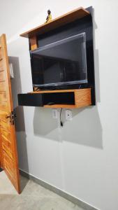 TV a/nebo společenská místnost v ubytování Casa temporada Flor de pitanga