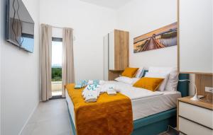 Postel nebo postele na pokoji v ubytování Pet Friendly Apartment In Malinska