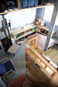 an overhead view of a room with wooden furniture at Camp k in Mokpo