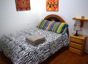 Carlos Guest House 2 Cusco客房内的一张或多张床位