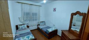 Postel nebo postele na pokoji v ubytování Appartement à OUED LAOU - TETOUAN + 23 fotografií