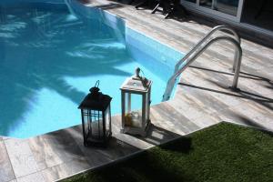 Bazén v ubytovaní Hotel Cariatis alebo v jeho blízkosti