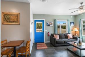 a living room with a couch and a table at Castle in the Sky Unit X in West Yellowstone
