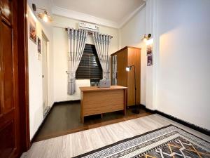 Postel nebo postele na pokoji v ubytování BÊ TÔNG RESIDENCES HOMESTAY