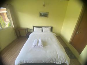 Letto o letti in una camera di Ocean Inn