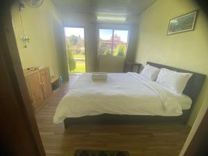 Letto o letti in una camera di Ocean Inn