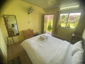 Letto o letti in una camera di Ocean Inn