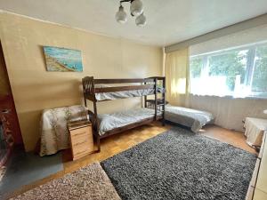Postel nebo postele na pokoji v ubytování Lake hostel