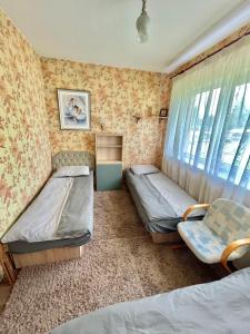 Postel nebo postele na pokoji v ubytování Lake hostel