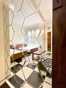 Postel nebo postele na pokoji v ubytování BÊ TÔNG RESIDENCES HOMESTAY