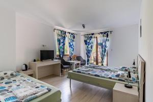 Postel nebo postele na pokoji v ubytování Hosteria na Mazurach