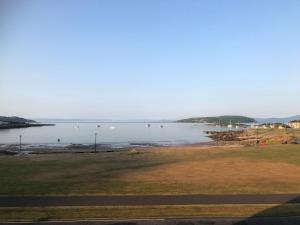 a view of a body of water with boats in it at 4 Kames Bay in Millport