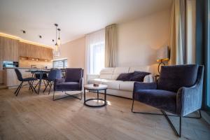 Posezení v ubytování Holiday House U Hájenky 6L Lipno Home
