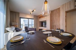 Posezení v ubytování Holiday House U Hájenky 6L Lipno Home
