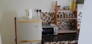 Kuchyň nebo kuchyňský kout v ubytování LeBovallon B&B