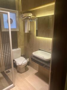 Et badeværelse på Green House Hotel