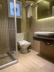 Et badeværelse på Green House Hotel