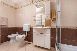 Koupelna v ubytování Apartment Krebelj by El-Pi Tours