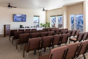 a conference room with a table and chairs at Sierra Grande Lodge & Spa in Truth or Consequences +28 photos