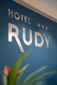 a sign for a hotelrip with stars on it at Hotel Rudy in Riva del Garda