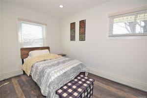 Postel nebo postele na pokoji v ubytování Romance Vacation Sweet Home