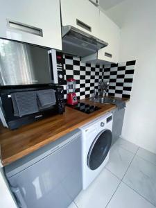 Photo de la galerie de l'établissement Le Cocon Blanc studio Jeux O, à Épinay-sur-Seine