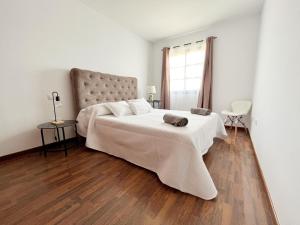 Posteľ alebo postele v izbe v ubytovaní FTV Holidays Homes