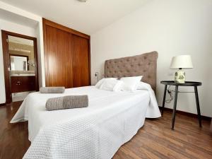 Posteľ alebo postele v izbe v ubytovaní FTV Holidays Homes