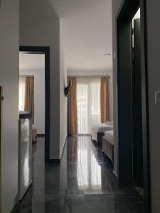 Postel nebo postele na pokoji v ubytování Hotel LEODORI 3 suites