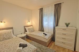 Posteľ alebo postele v izbe v ubytovaní Holiday Home Bulog + 37 fotografií