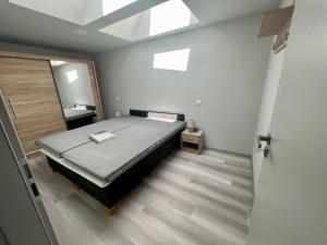 Postel nebo postele na pokoji v ubytování Pondos