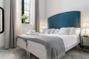 Posteľ alebo postele v izbe v ubytovaní San Buenaventura Apartment 1