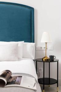Posteľ alebo postele v izbe v ubytovaní San Buenaventura Apartment 1