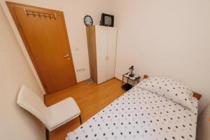 Postel nebo postele na pokoji v ubytování Apartman Marija