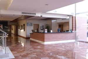 Lobby o reception area sa TCH Hotel