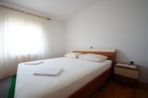 Postel nebo postele na pokoji v ubytování In Apartment